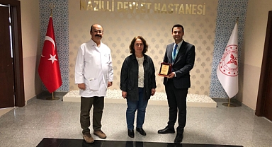 NDH'NİN EMEKLI OLAN DOKTORU FERAH ARSLAN'A PLAKET VERİLDİ