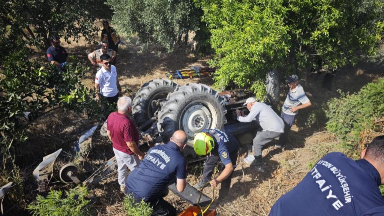 TRAKTÖRÜN ALTINDA KALAN ŞAHSI EKİPLER UZUN UĞRAŞLAR SONUCU KURTARDI